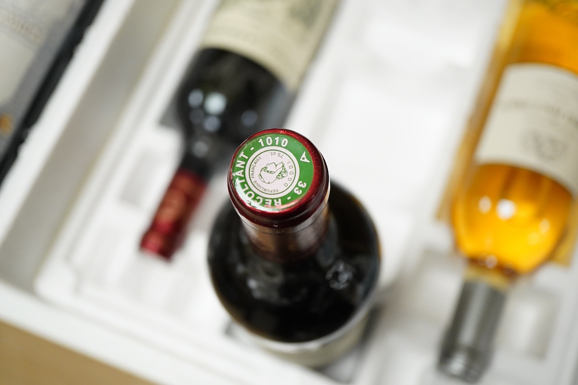 Six bottles of mixed wines, including a bottle of Margaux, Chateau-Lascombes grand cru 2000, a bottle of Larrivet Haut Brion, 2010, two bottles of Chateau Carbonnieux grand cru 2005, a bottle Chateau Grand- Pontet grand
